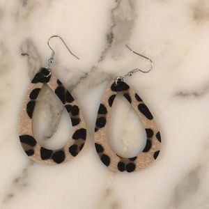 Cheetah faux fur earrings.